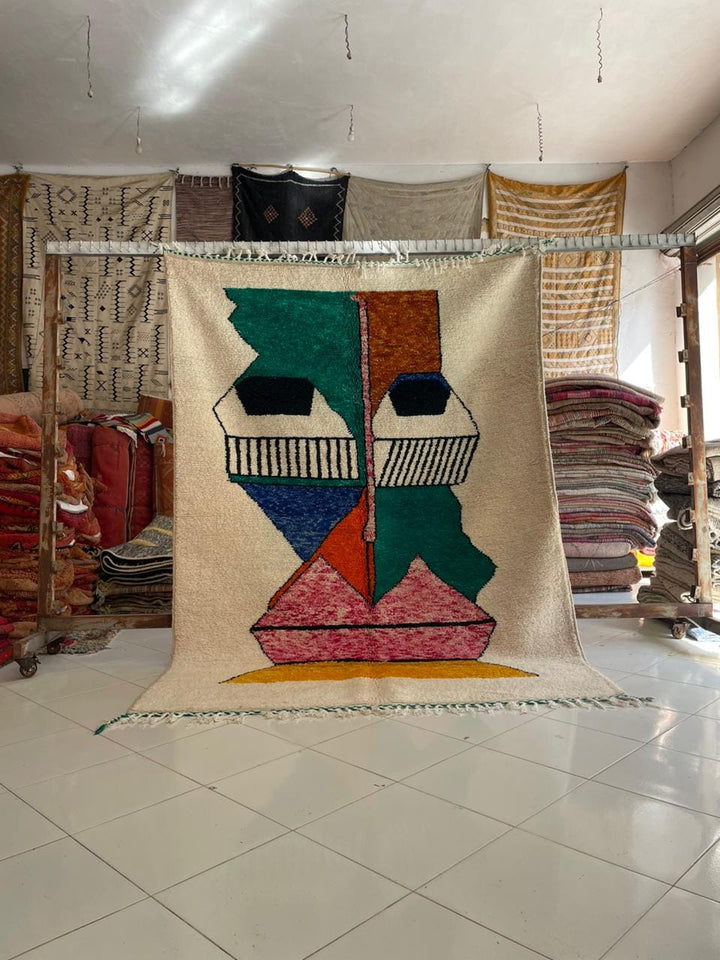 Lifestyle shot of a colorful Moroccan rug featuring geometric patterns in a natural setting.