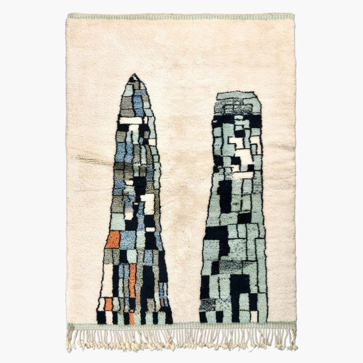 Front view of the abstract area rug featuring geometric patterns in beige, blue, and orange.