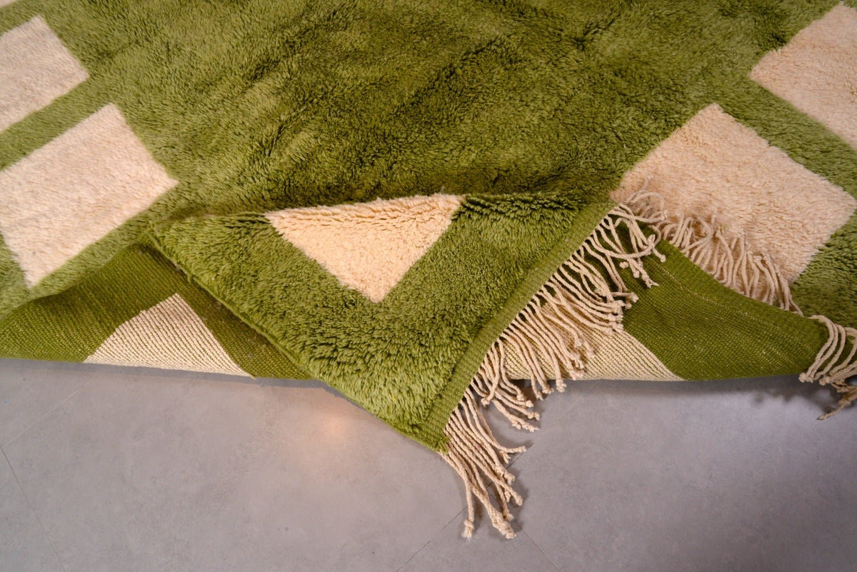 Top view of the rectangular green Moroccan rug highlighting its soft texture.