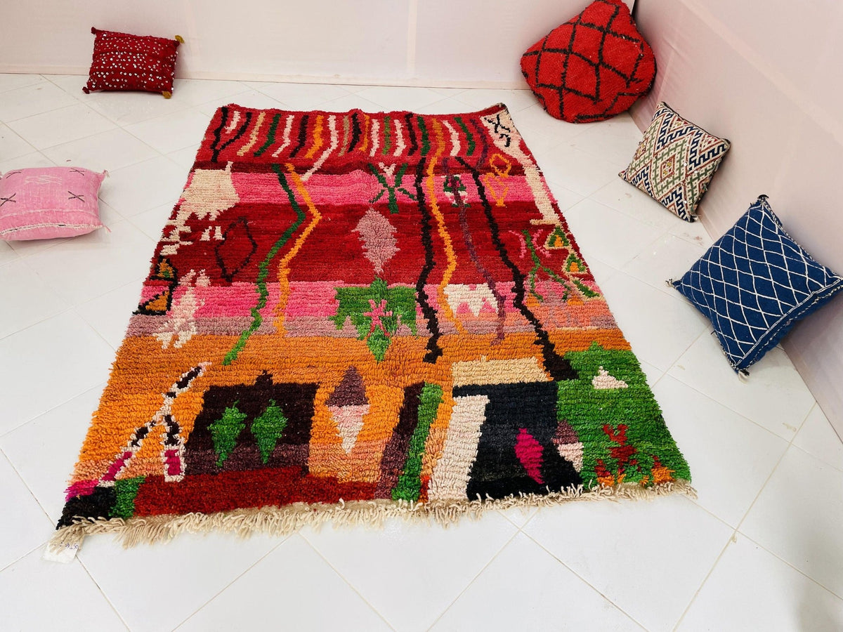 Detail view of the corner of the rug showcasing woven texture and colorful patterns.