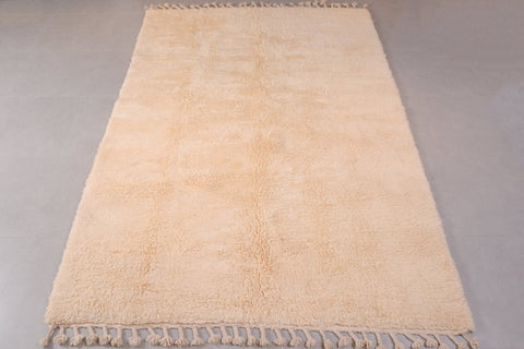 Flat weave of the off-white Moroccan rug displayed in a large size.