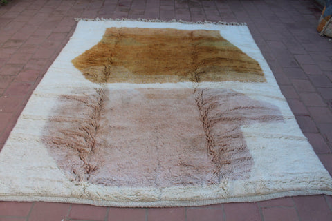 Front view of the brown and cream Moroccan Mrirt rug showcasing its Berber design.