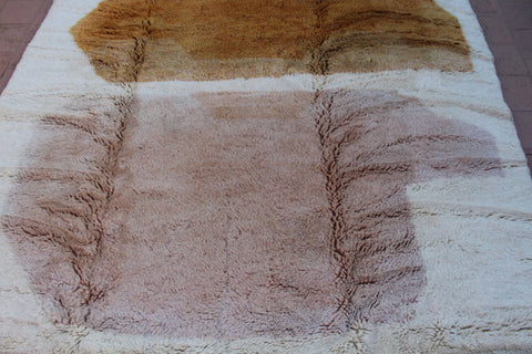 Detail close-up of the brown and cream Moroccan Mrirt rug showcasing its Berber design.
