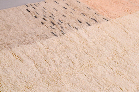 Close-up of the textured surface and fringe edges of the Tizi N'Test Moroccan rug.