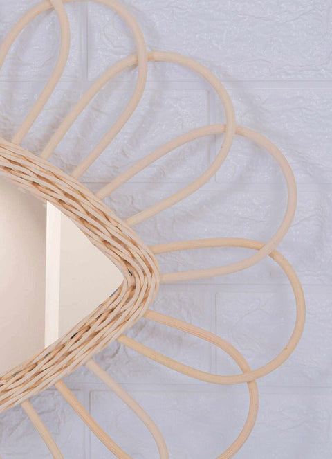 Miroir en oeil de rotin