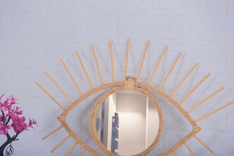 Miroir en oeil de rotin
