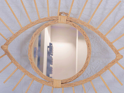 Miroir en oeil de rotin