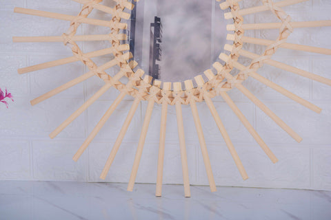 Miroir en oeil de rotin