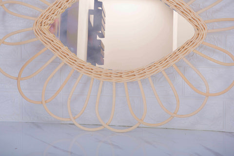 Miroir en oeil de rotin