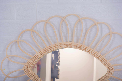 Miroir en oeil de rotin