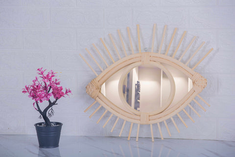 Miroir en oeil de rotin