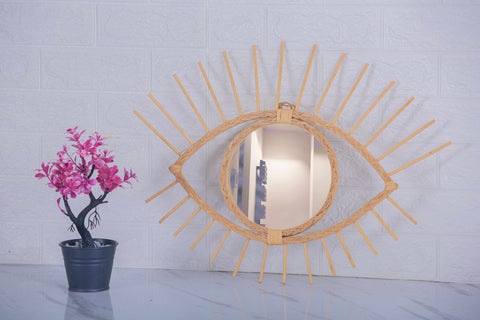 Miroir en oeil de rotin