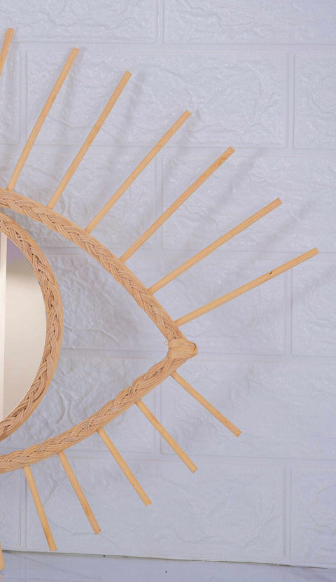 Miroir en oeil de rotin