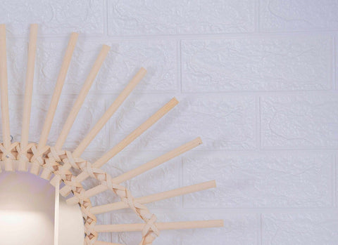 Miroir en oeil de rotin