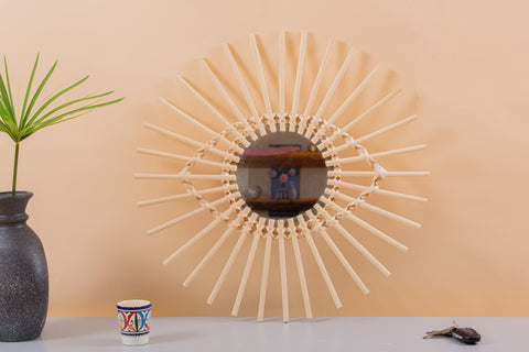 Miroir en oeil de rotin