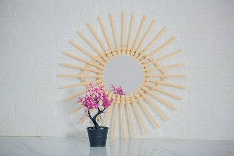 Miroir en oeil de rotin