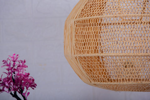 Suspension boule en raphia