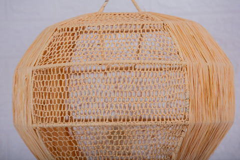 Suspension boule en raphia