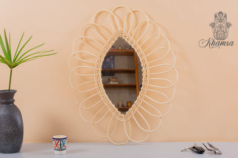 Miroir en oeil de rotin