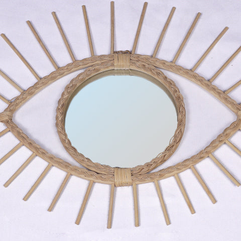 Miroir en oeil de rotin