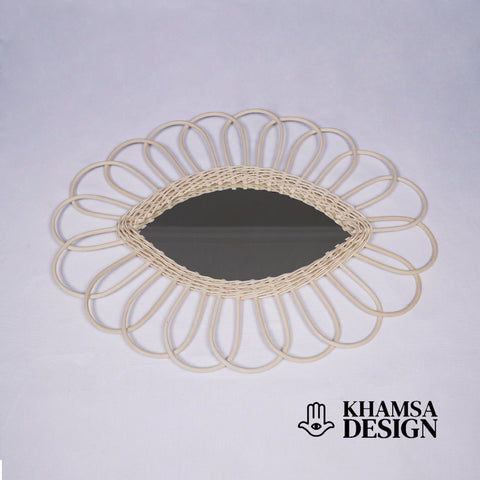 Miroir en oeil de rotin
