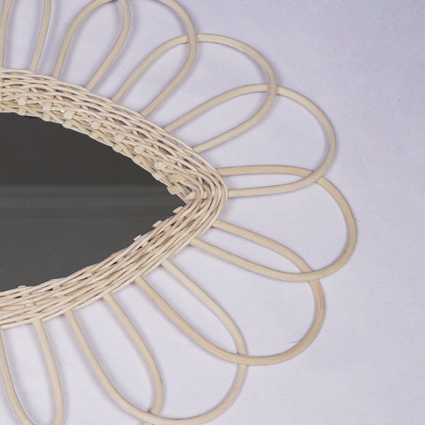 Miroir en oeil de rotin