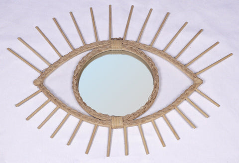 Miroir en oeil de rotin