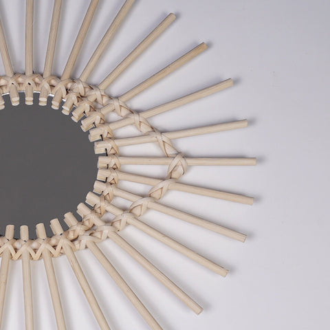 Miroir en oeil de rotin