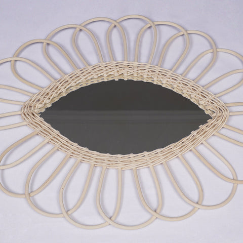 Miroir en oeil de rotin