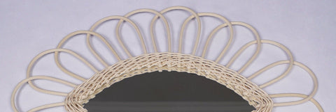 Miroir en oeil de rotin