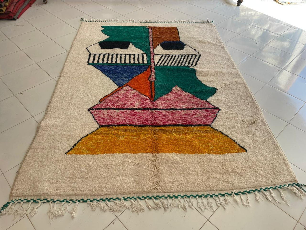 Top view of a colorful Moroccan rug showcasing its geometric patterns and vibrant colors.