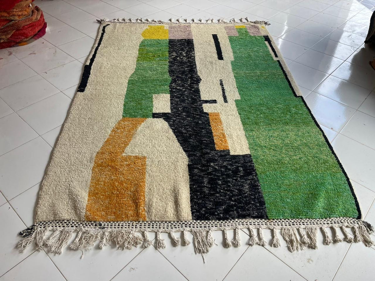 Front view of a colorful Moroccan rug showcasing its abstract design and vibrant colors.