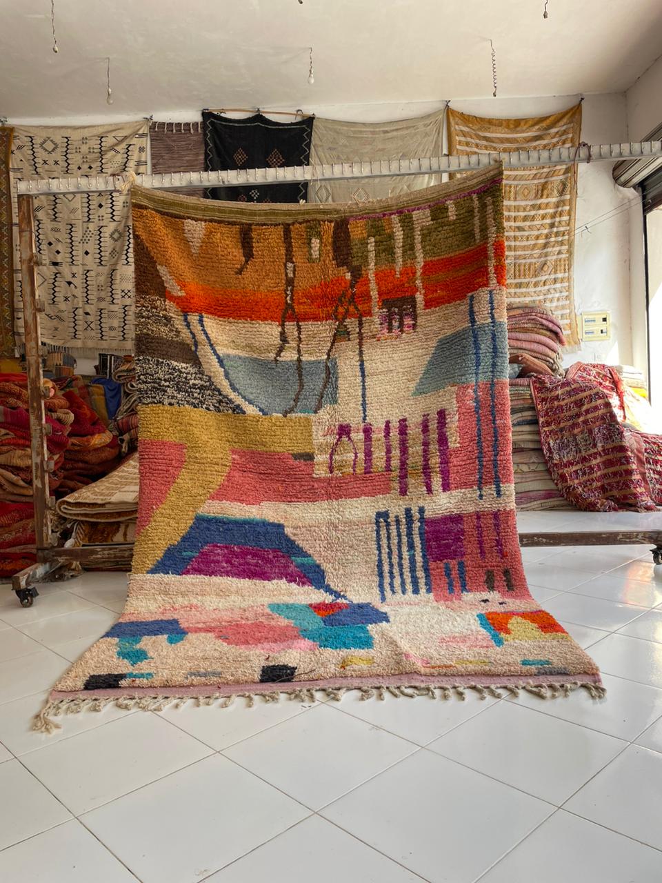 Lifestyle shot of a colorful Berber rug showcasing vibrant colors and geometric designs.