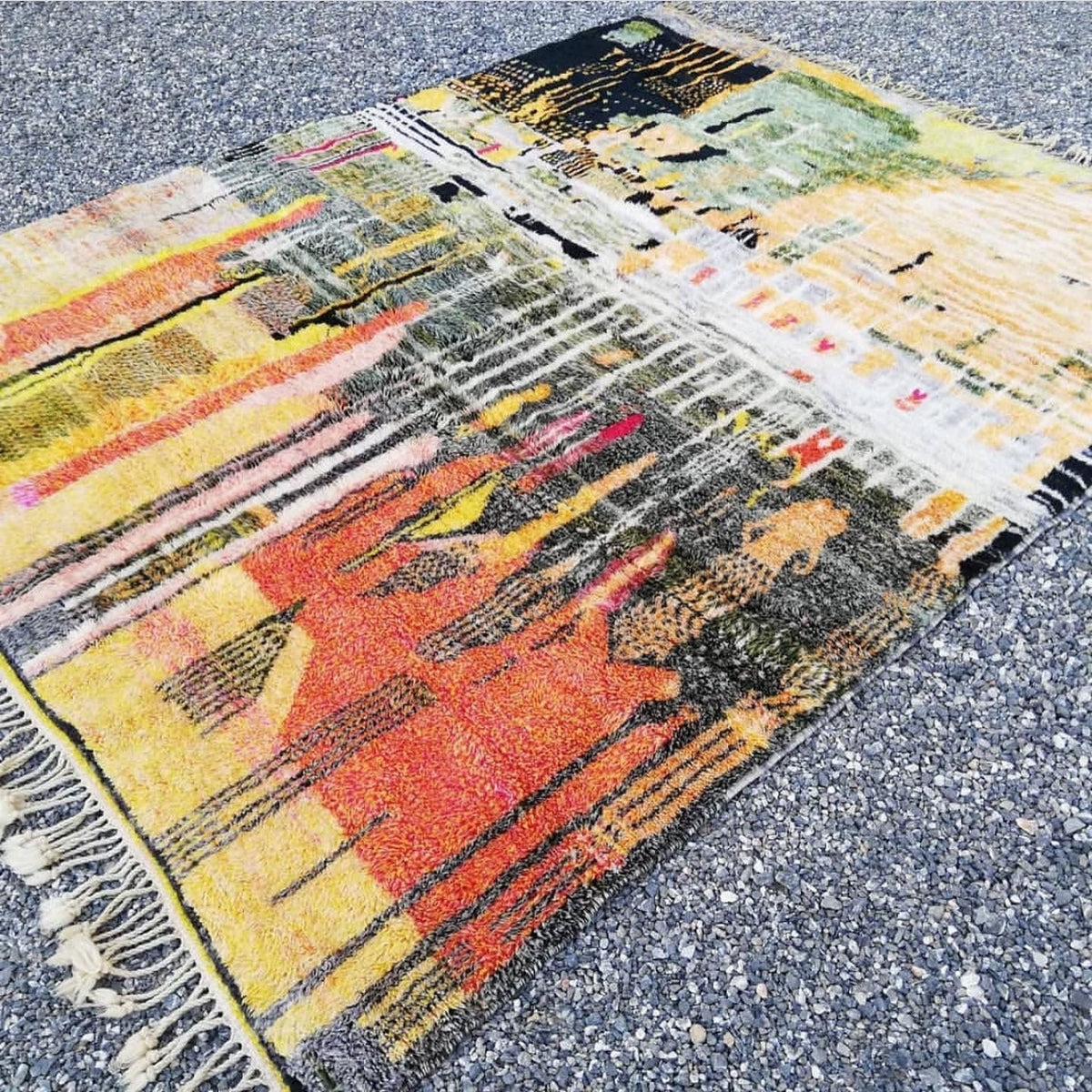 Lifestyle view of a Moroccan rug showcasing its colorful design and Berber style.