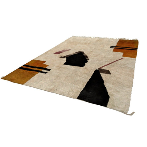Close-up detail of the cream and black abstract Moroccan rug highlighting its geometric design.