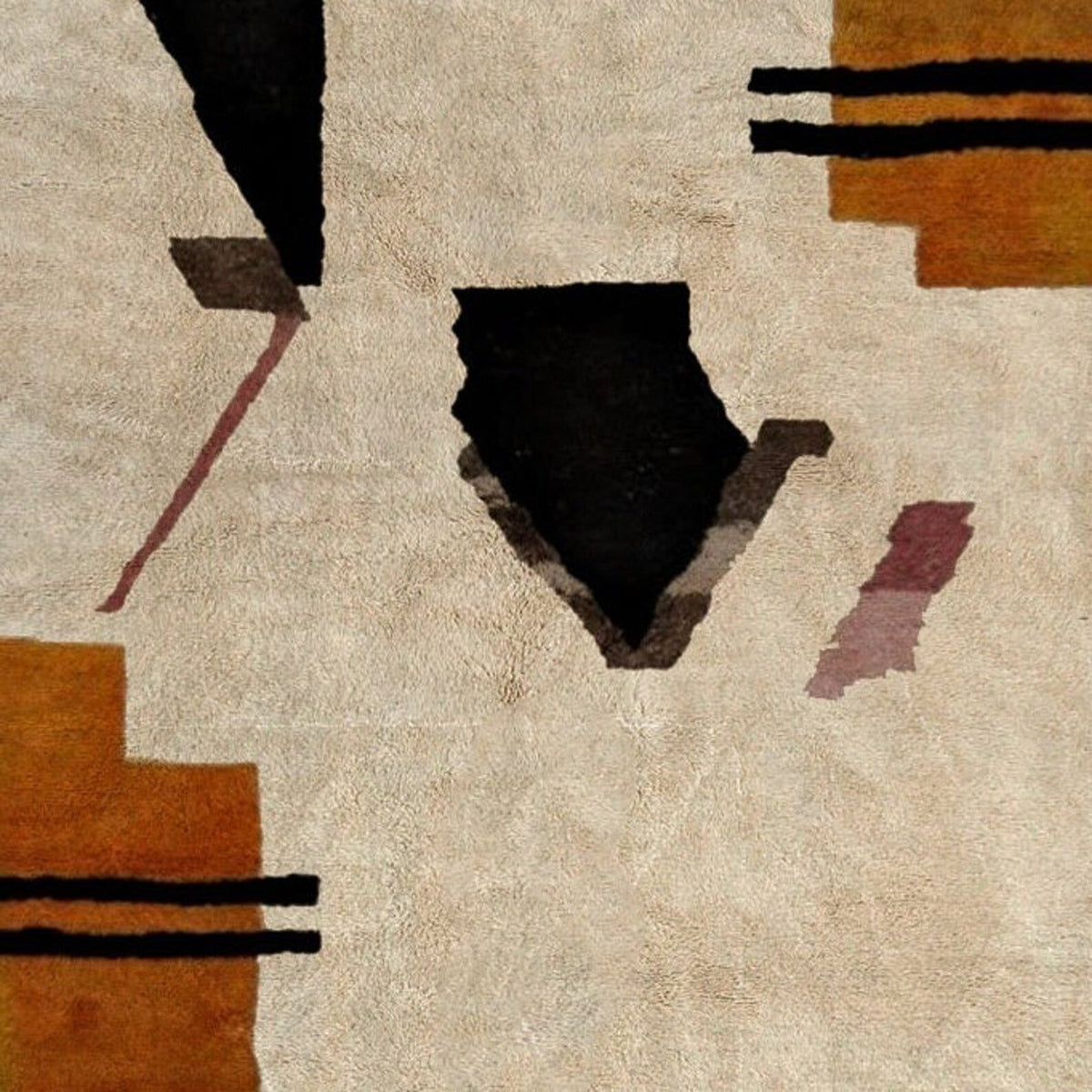 Close-up detail of the cream and black abstract Moroccan rug showcasing its geometric patterns.