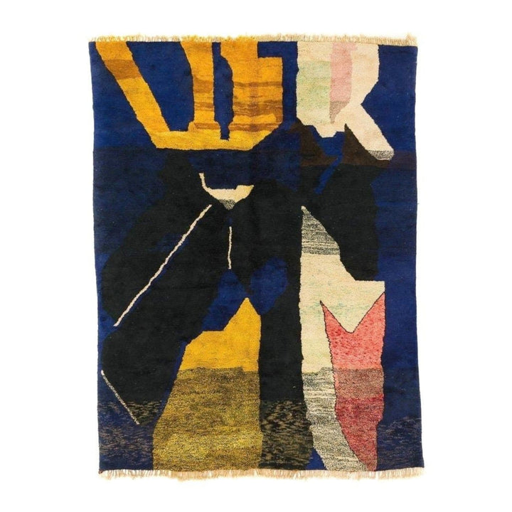 Front view of the black and gold geometric rug featuring an abstract design.
