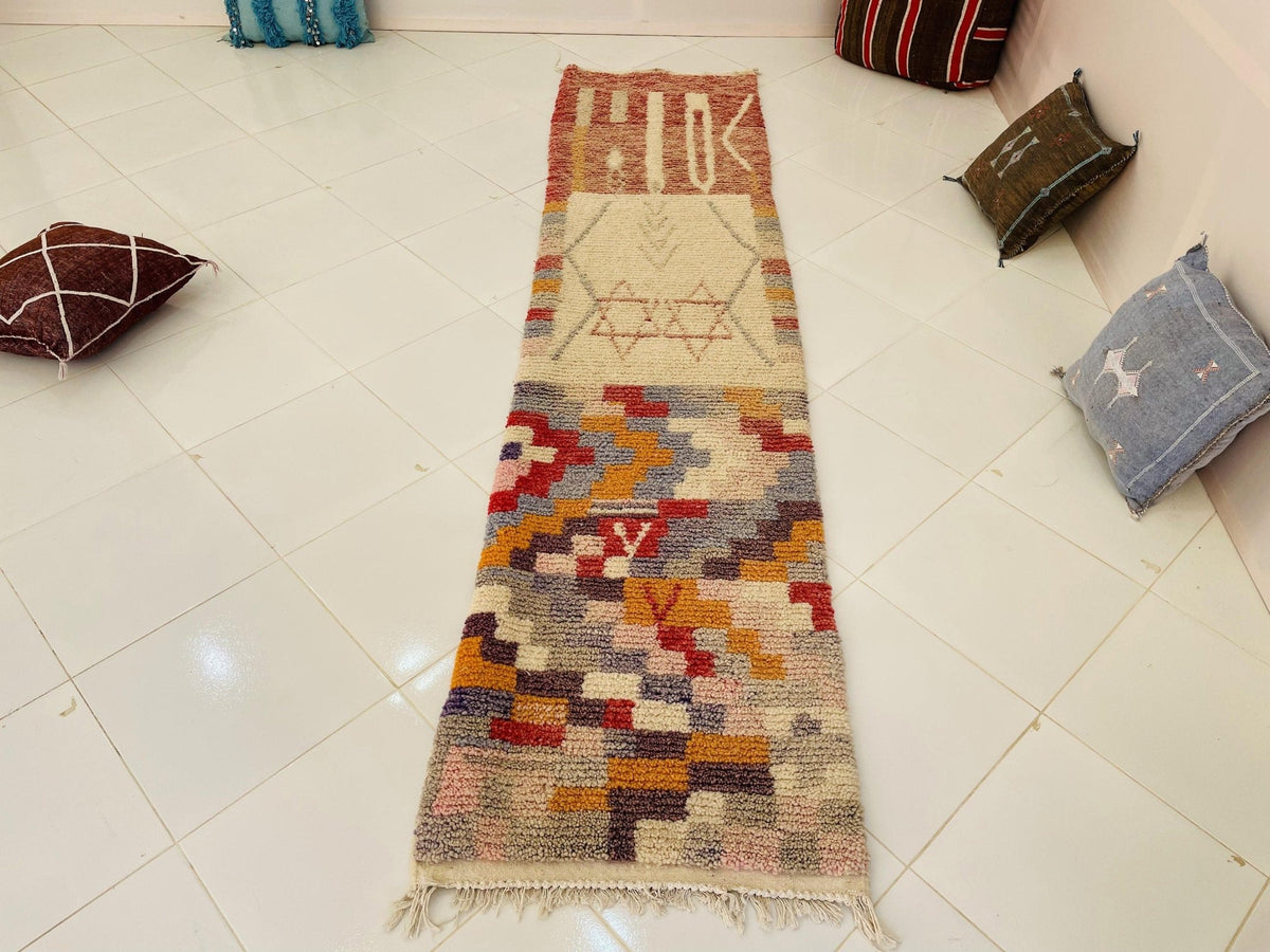 Close-up detail showcasing the woven texture and vibrant colors of the rug.