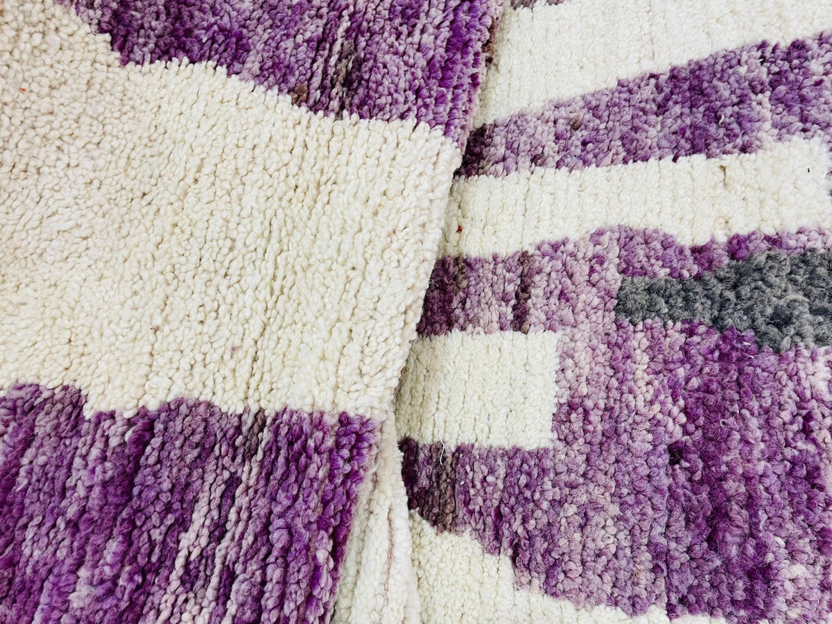Lifestyle view of the cream geometric vintage Moroccan runner rug showcasing its abstract design.