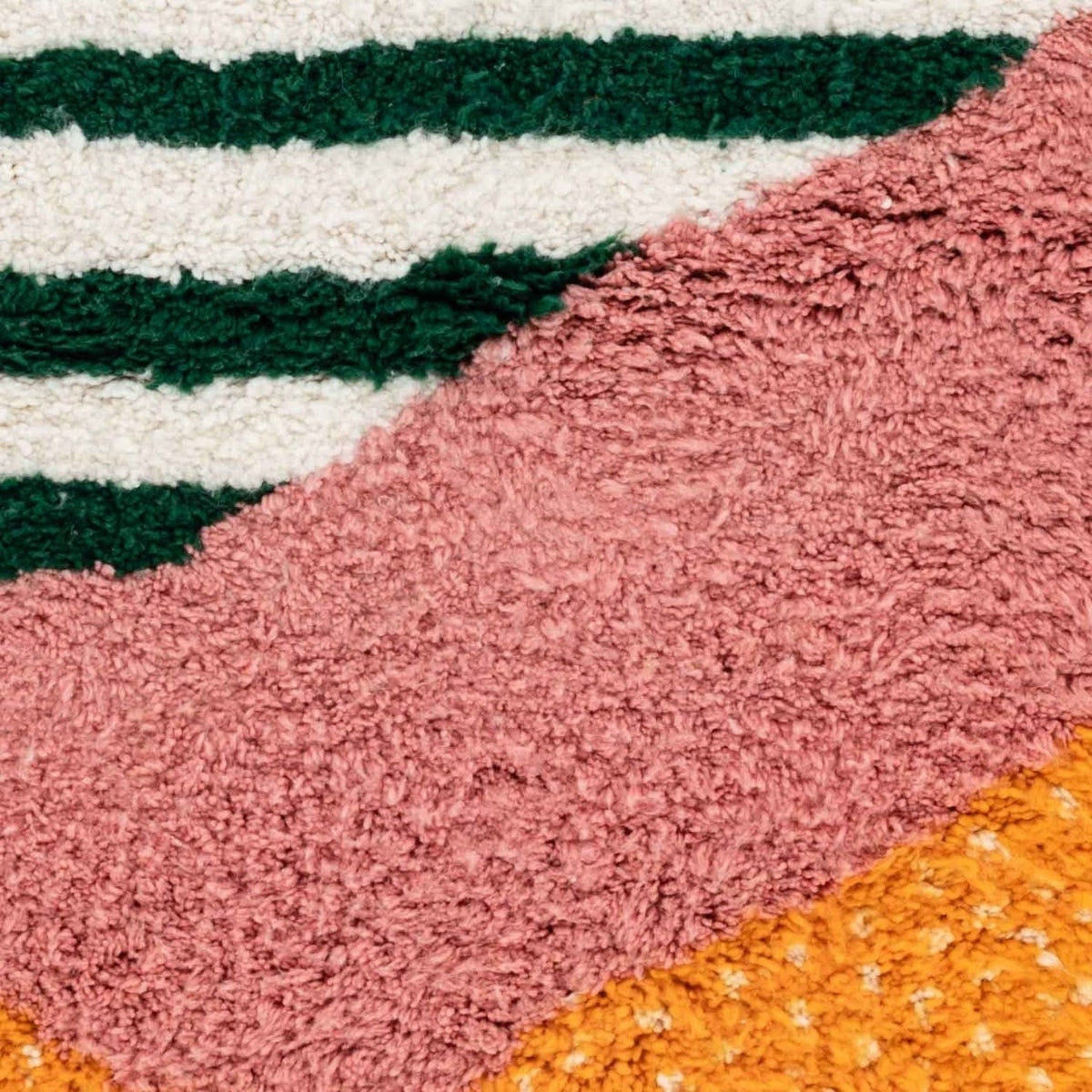 Front view of the colorful Azilal Moroccan rug featuring geometric designs and fringe edges.