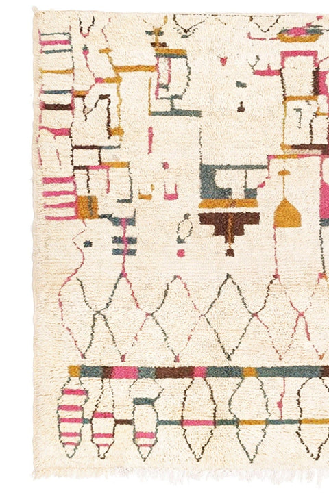 Detail close-up of geometric designs in a beige, red, and yellow Moroccan rug on a white background.