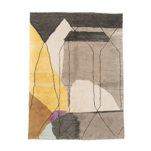 Front view of the gray, black, and mustard abstract rug featuring geometric designs.