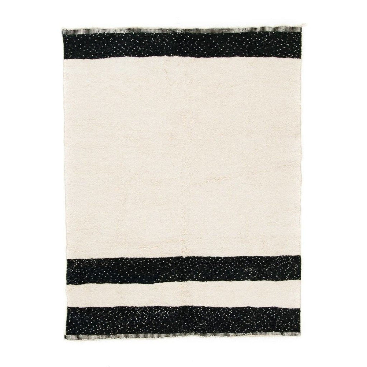 Front view of the black and cream striped Moroccan rug on a white background.
