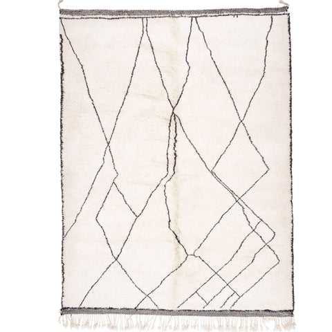 Front view of the abstract black and off-white geometric pattern rug.
