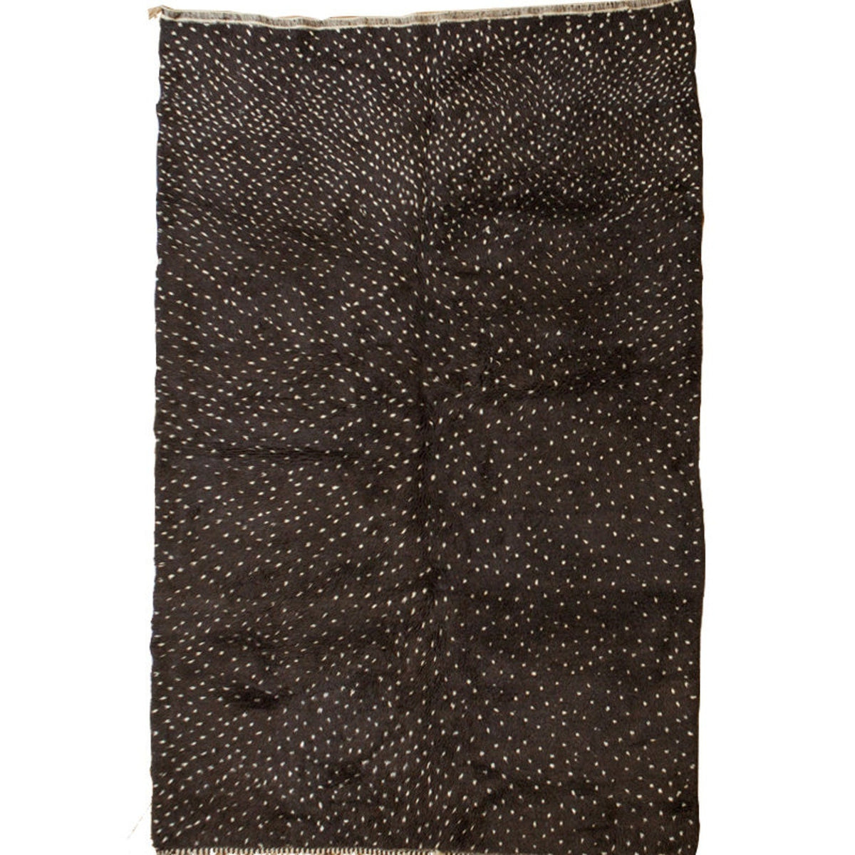 Front view of the black and off-white Beni Ourain Moroccan rug with a Berber design.