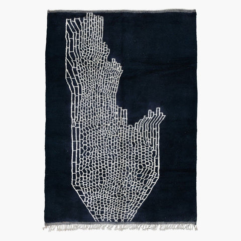 Front view of a black and gray abstract Moroccan rug with geometric patterns.