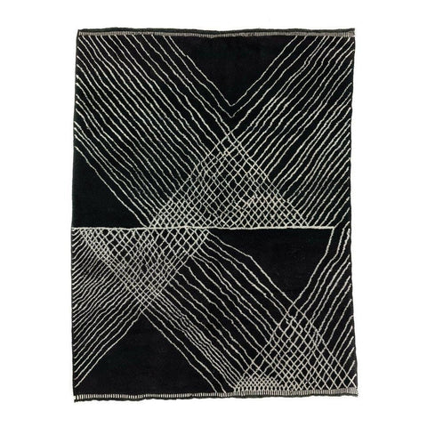 Front view of a black geometric patterned Moroccan rug with a soft texture.