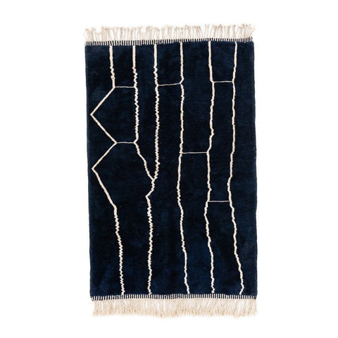 Front view of a black and white abstract Beni Ourain Moroccan rug with geometric patterns.