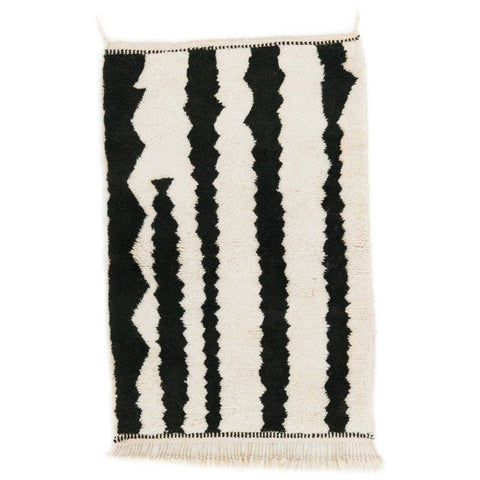 Front view of the black and cream striped Beni Ourain Moroccan rug with geometric pattern.