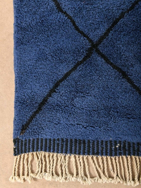 Front view of the blue diamond pattern rug showcasing its design on a white background.